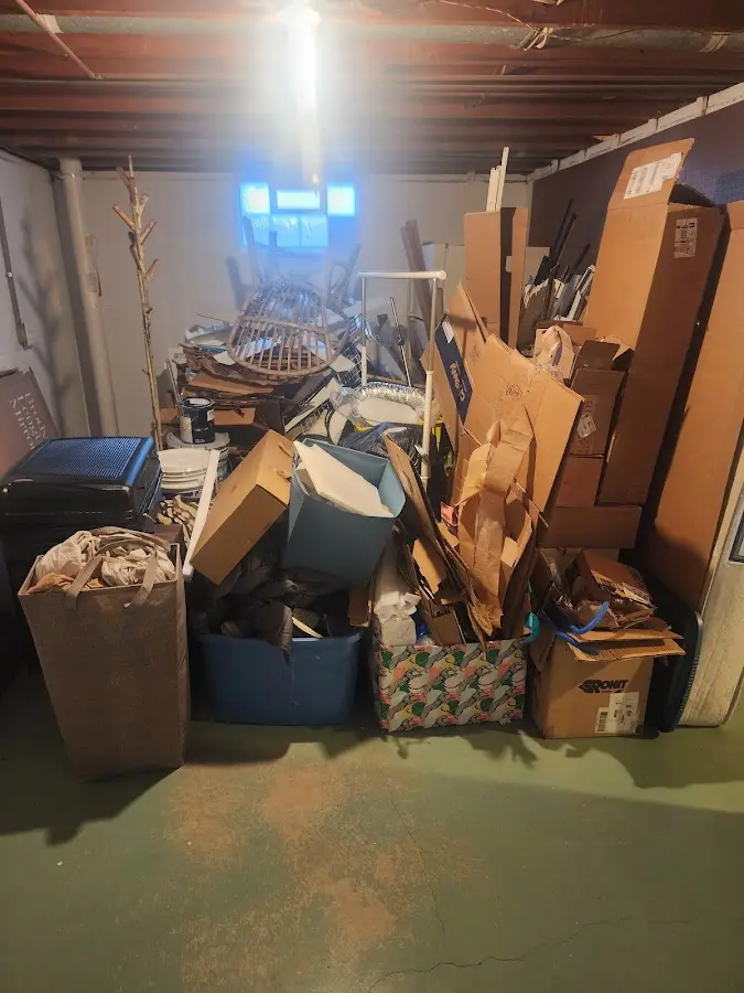 Roll-off dumpster container at job site for Concrete Dumpster Rental in Avon